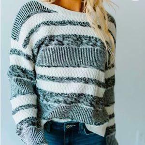 Women’s black and white abstract sweater size small